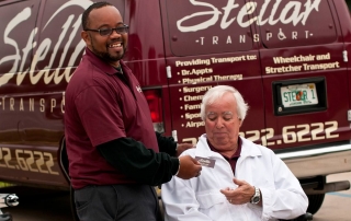 Stellar employee with wheelchair client.