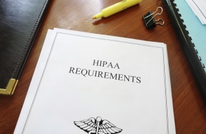 HIPAA Requirements healthcare privacy document on an office desk