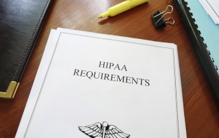 HIPAA Requirements healthcare privacy document on an office desk